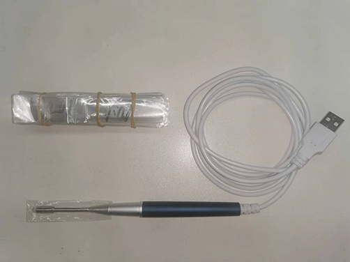 Otoscope with disposable hygiene bag